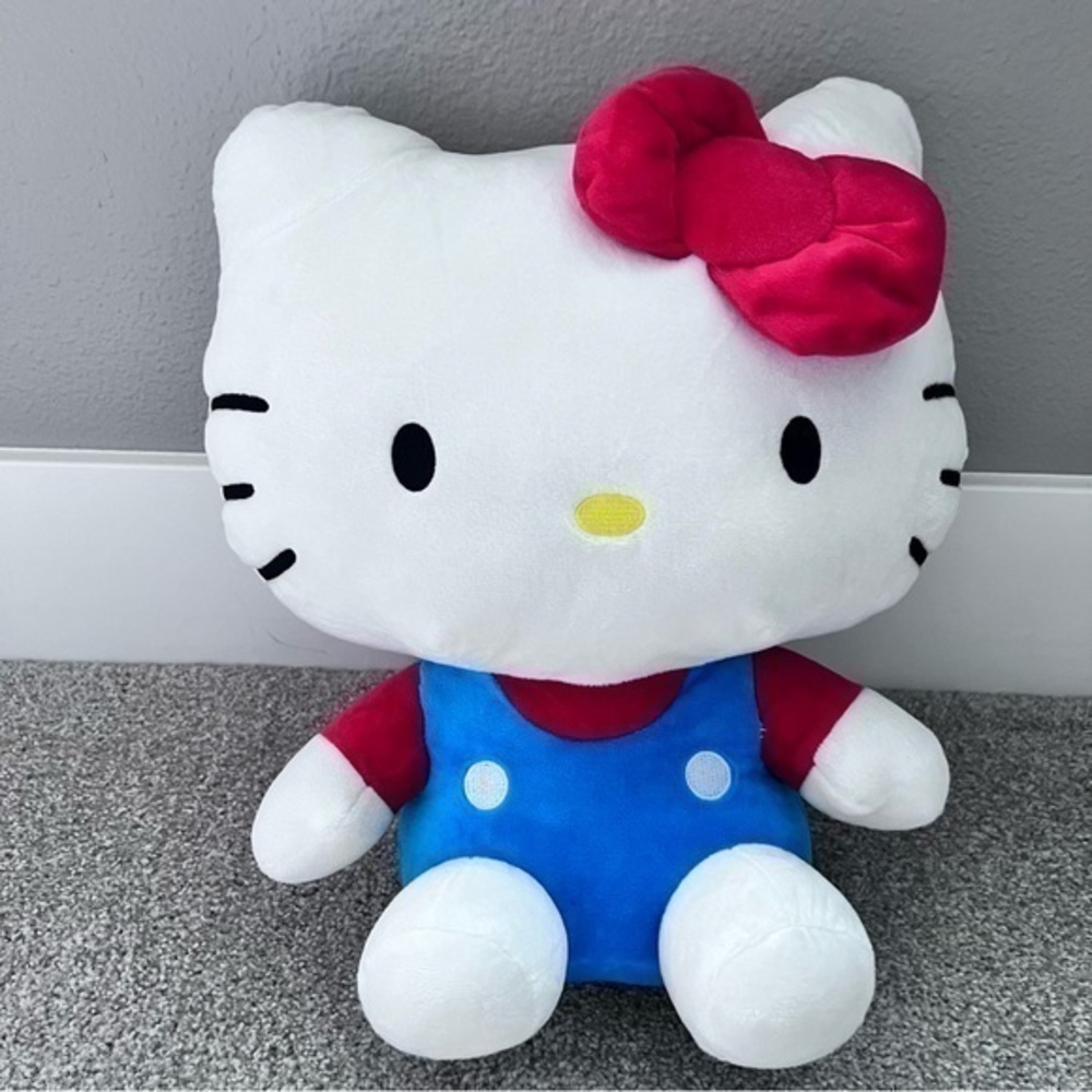 NWT Hello Kitty plush backpack with small snack/ toy pocket